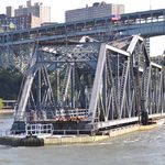 The Spuyten Duyvil Bridge carries trains from Upstate and Toronto into Penn Station. Boats have the right of way so the bridge swung open for the tour's boat to pass.